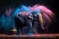 Elephant covered in colored powder standing next to a pot at Holi Festival in India Royalty Free Stock Photo