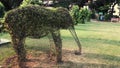 an elephant figure whit plants in park