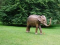 elephant sculpture made of an invasive plant displayed in a park