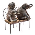 Elephant sitting on chair Royalty Free Stock Photo