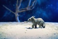 Elephant walks through the dry desert at night Royalty Free Stock Photo