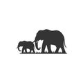 Elephants roam grassy plains icon