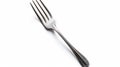 Stainless Steel Fork on White Background - Modern Cutlery Photography for Kitchen and Dining Concepts.