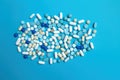 Medical Pills and Capsules Isolated on Colorful Background AI Generated Illustration