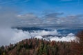 Elevated aerial view inversion clouds rolling in the valley Royalty Free Stock Photo