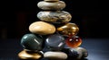 Elevated Equilibrium: Impossibly Stacked Polished Rocks in Black, Gold, and Silver