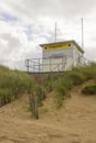 An elevated lifeguard tower on the sand dunes at Benone beach on the north coast of ireland in county Londonderry shut up for the Royalty Free Stock Photo