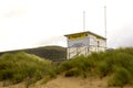 An elevated lifeguard tower on the sand dunes at Benone beach on the north coast of ireland in county Londonderry Royalty Free Stock Photo