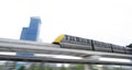 Elevated monorail train fast move on rail. Public transit monorail. Modern mass transit. Rail transportation. Driverless straddle