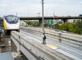 Elevated monorail train on rail. Public transit monorail. Modern mass transit. Rail transportation. Driverless straddle monorail