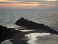 Panorama view of seaside Castle Point Lighthouse on steep cliff hill, Tasman Sea Pacific Ocean Wellington New Zealand Royalty Free Stock Photo