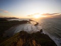 Panorama view of seaside Castle Point Lighthouse on steep cliff hill, Tasman Sea Pacific Ocean Wellington New Zealand Royalty Free Stock Photo