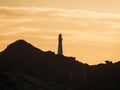 Panorama view of seaside Castle Point Lighthouse on steep cliff hill, Tasman Sea Pacific Ocean Wellington New Zealand Royalty Free Stock Photo