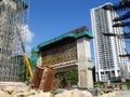 An elevated road is under construction. Reinforced concrete is used for the structure.