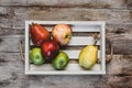 elevated view of apples and pears in wooden box Royalty Free Stock Photo