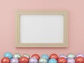 Elevated view brown wood picture frame & blank white paper for copy space & colorful balloon on pink background, highly detailed