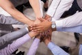 Elevated View Of Businesspeople Stacking Hands