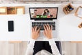 Elevated View Of Businessperson Videoconferencing On Laptop