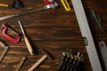 elevated view of different tools on brown wooden tabletop Royalty Free Stock Photo