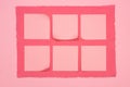 elevated view of empty stick it notes on pink