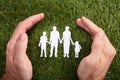 Human Hand Protecting Family Paper Cut Out Royalty Free Stock Photo