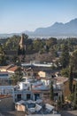 Nicosia cityscape with church and mountains. Cyprus