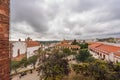 Elevated view of a quaint Portuguese courtyard surrounded by historic buildings and terracotta