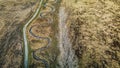 Elevated view of spiraling river with walking trail