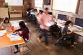 Elevated View Of Workers In Busy Modern Design Office Royalty Free Stock Photo