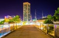 Elevated walkway and the World Trade Center at night in Baltimore, Maryland. Royalty Free Stock Photo