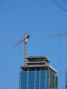 Elevating cranes. Building.