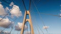 Elevating the Sky: A Cable-Stayed Bridge Against a Blue Sky Royalty Free Stock Photo