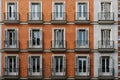 Elevation View of Old Luxury Residential Building with Brick Facade and Balconies Royalty Free Stock Photo