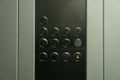 Elevator button control panel closeup. Disinfection, cleanliness and health care, anti corona virus, COVID-19. Selective Royalty Free Stock Photo