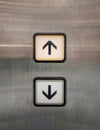 Elevator buttons for up and down with arrows.
