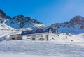 Elevator cabin about the station in ski resort. View of mountains and mechanisms and pillar of the elevator, Pyrenees, Andorra,