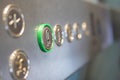 Elevator control panel with illuminated button in modern building Royalty Free Stock Photo