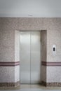 elevator door and granite wall Royalty Free Stock Photo