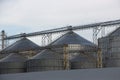 Elevator, huge container of the granary against the background of the blue sky