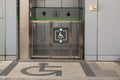 Elevator for people with disabilities. Disabled persons lift near modern apartment facility. The special elevator for the disabled Royalty Free Stock Photo