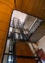 Elevator and spiral staircase in an old house in Budapest, Hungary Royalty Free Stock Photo