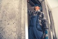 Elevator Technician Performing Scheduled Check