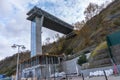 Elevator for tourists from the sea coast. Construction of the elevator on the street. An unfinished street elevator