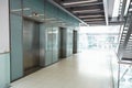 Elevators in the empty corridor of a corporate business Royalty Free Stock Photo