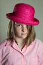 Eleven year old girl in oversized pink blouse Royalty Free Stock Photo