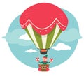 Elf with presents for Christmas, hot air balloon Royalty Free Stock Photo