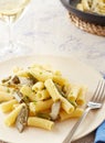 Elicoidale pasta with artichokes and green beans Royalty Free Stock Photo