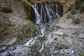 Elif Waterfall, Kapuzbasi Waterfall in Aladaglar National Park Green trees round the waterfall