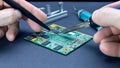 Elimination of malfunctions on the laptop board.With a soldering iron and tweezers, we solder the microcircuit on the board. Close