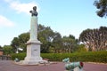 The Eliott Memorial column surrounded by cannons inside the La Alameda Gardens which are a botanical gardens in Gibraltar.